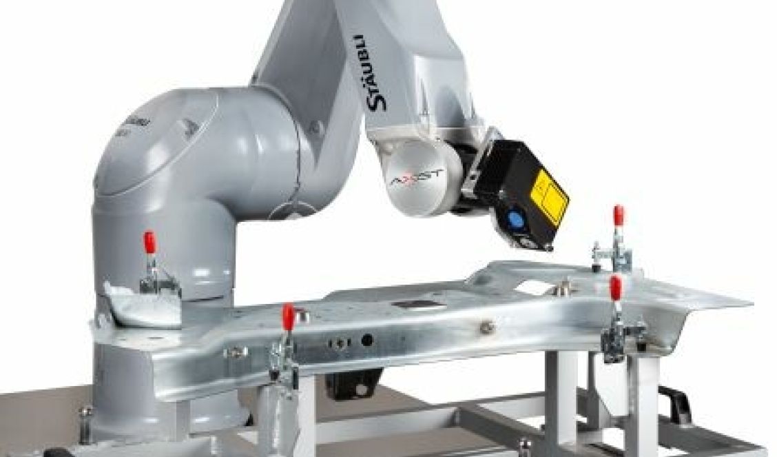 Tailored AXIST robotics automated metrology solution designed for unique automotive part inspection requirements.