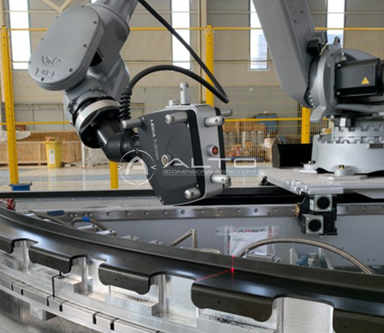 Industrial robotic arm with a Leica T-Scan laser scanner projecting a red laser line onto a curved black component during a 3D dimensional inspection.