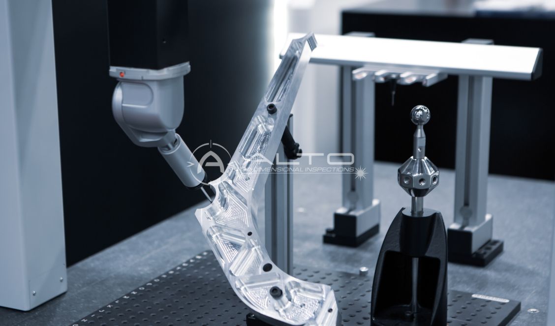 Close-up of a CMM probe inspecting the precise dimensions of an automotive component.